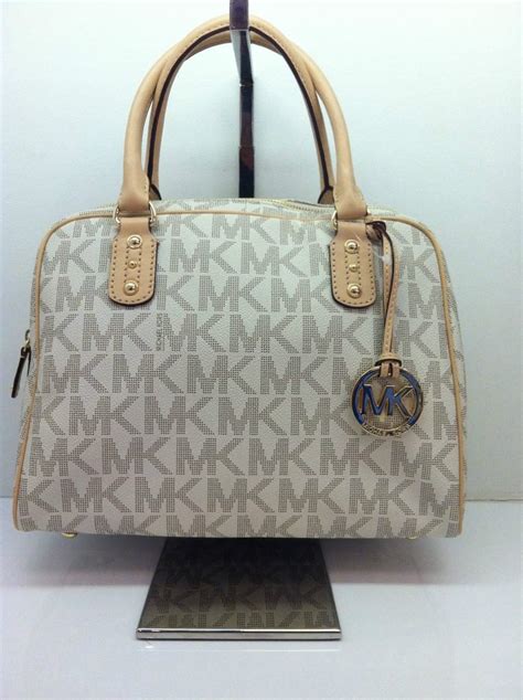 originales bolsos michael kors|bolsa michael kors original precio.